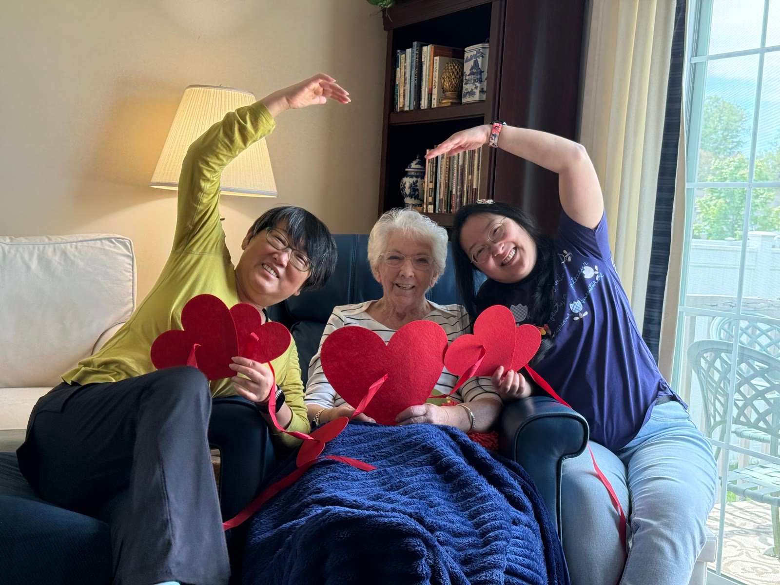 Three generations: Beth, Eliza, Jessica with red hearts